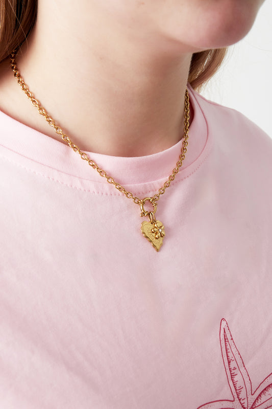 Halsband med hjärtberlock och rosa detaljer