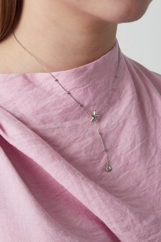 Halsband med sjöstjärna och snäckskalberlock