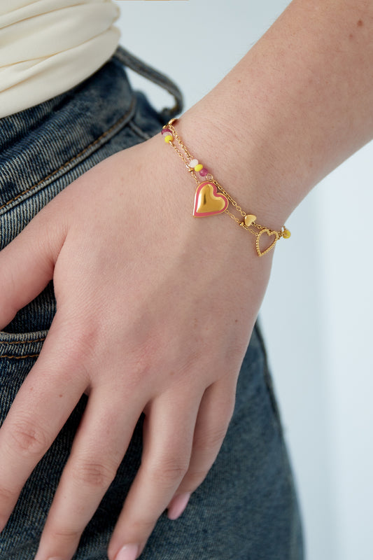 Armband med färgglada hjärtan och pärlor