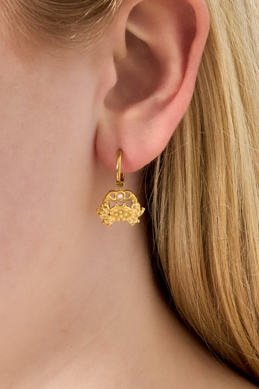 Örhängen med krabbaberlock