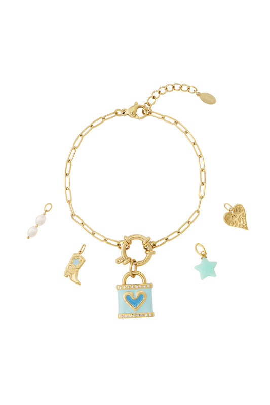 Armband med gyllene lås och utbytbara westernberlocker