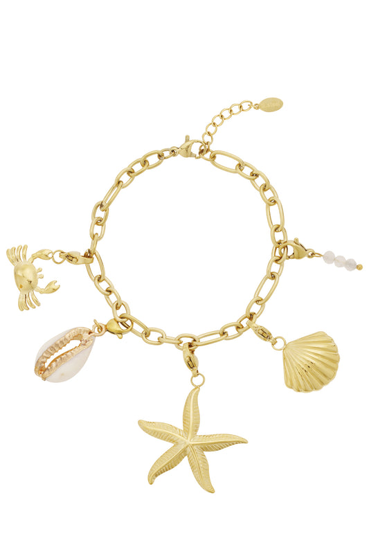 Gyllene strandarmband med sommarvibbar