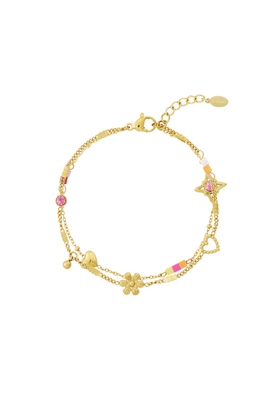 Armband med berlocker och blommor